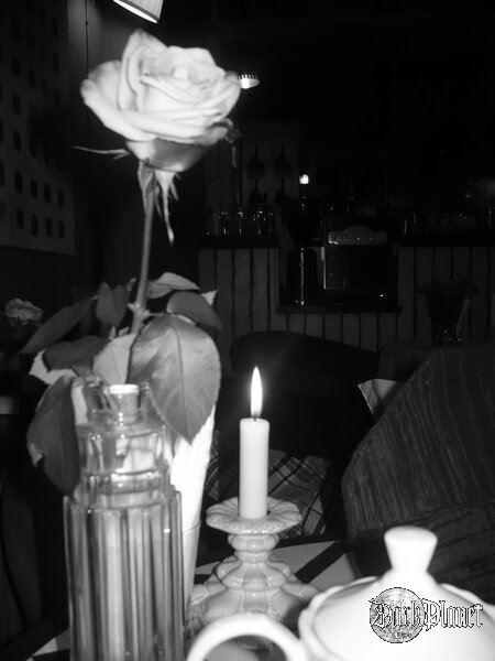 Rose & Candle. 